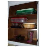 Kitchen Cabinet Assortment of Bakeware, Storage Containers, and Pitcher