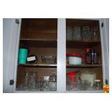 Assorted Kitchen Cabinet Lot featuring Glassware, Storage Containers, and Drinkware