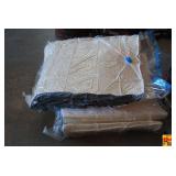 Lot of Two Vacuum-Sealed Foam Cushions and Pads