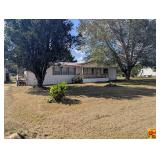 3-Bedroom Double-Wide Mobile Home On 0.6 Acre± Lot.  An excellent income producer.