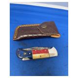 Folding Pocket Knife with Damascus Blade and Patriotic Handle Accompanying Leather Sheath