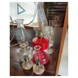 Group of Five Assorted Glass Oil Lamps with Chimneys
