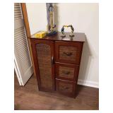 Wooden Cabinet with Wicker Panels and Coastal Decor Grouping