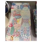 Handmade Patchwork Quilt with Floral and Geometric Patterns