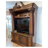 Large Wooden Entertainment Center with Corinthian Columns and Storage Base