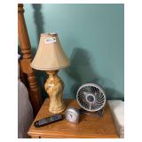 Bedroom Decor Grouping with Table Lamp, Fan, Clock, and Framed Art