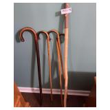 Collection of Wooden Walking Sticks and Heart-Shaped Trinket Dish