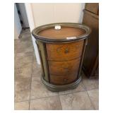 Oval Wooden Accent Table with Three Drawers and Painted Scrollwork