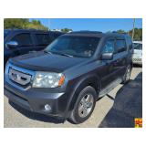 2011 Honda Pilot; 165,492 miles; VIN 5FNYF3H79BB024984; Rebuilt Title