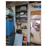 Shelving Unit with Automotive Parts, Radios, and Vacuum Pump