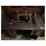 White Family Rotary Treadle Sewing Machine in Wooden Cabinet