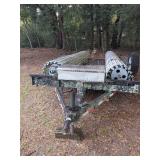 Dual Axle Utility Trailer with Rolled Metal Siding and General Drill Press