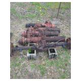 Assorted Fire Hydrants and Vehicle Axle Assembly