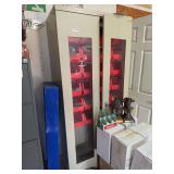 Metal Storage Cabinet with Red Bins, Cola Bottles, and Statues