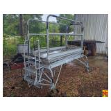 Rolling Work Platform with Safety Rails and Integrated Stairs