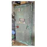 Metal Storage Cabinet with Hubcaps and Automotive Parts