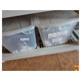 Assorted PVC Valves, Hoses, and Plumbing Hardware in Storage Bins
