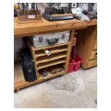 Wooden Workbench with Integrated Storage Shelves and Metal Vise