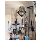 Assorted Garage and Workshop Tools on Pegboard