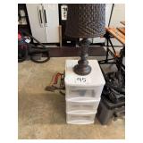 Table Lamp On Plastic Storage Drawers