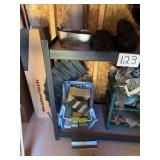 Shelf Contents Including Planters, Nets, and Storage Baskets