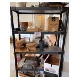 Shelving Unit With Assorted Craft Wood Pieces and Workshop Supplies