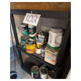 Shelving Unit With Assorted Paint, Stain, Primer, and Finishing Supplies