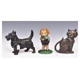 Three Cast Iron Door Stops