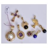 Eight 14k Gold Pendants