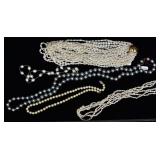 Four Pearl Necklaces