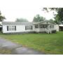 DICK CHITTAM REALTY & JOHN STEWART AUCTION CO. ESTATE 3-BEDROOM MANUFACTURED HOME ON 0.4 ACRE LOT