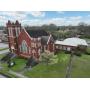Historic Brick Commercial Complex  16,704+/- Sq Ft  1.42+/- Acres  Talladega, Alabama