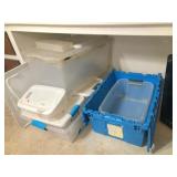 several plastic totes