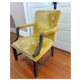 yellow velvet covered arm chair