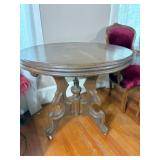 antique round table 32" Dia. on wheels