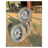 4) 245/30ZR22 tires on universal rims