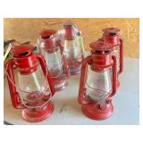 5 red kerosene lanterns