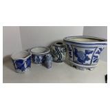 Five Blue and White Decorative Vases and Planter