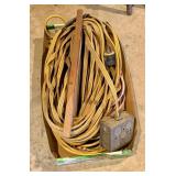 Extension Cords - One is Wired to an Outlet Box