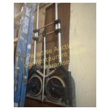 Hand truck with flip storage wheels