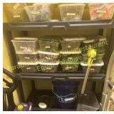 Black plastic shelf with 19 bins