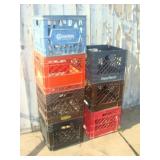 Seven Plastic Milk Crates
