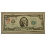 Two Dollar Bill with Post Mark of Release Date