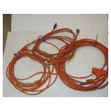 Three Orange Electrical Cords