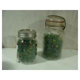 Two Jars of Cat Eyed Marbles