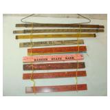 Nine Advert Rulers on a Hanger