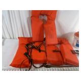 Three Orange Life Jackets