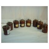 Eight Brown Cheese Crocks