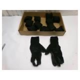 A Dozen Black Rolled Up Gloves