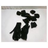 A Dozen Black Rolled Up Gloves